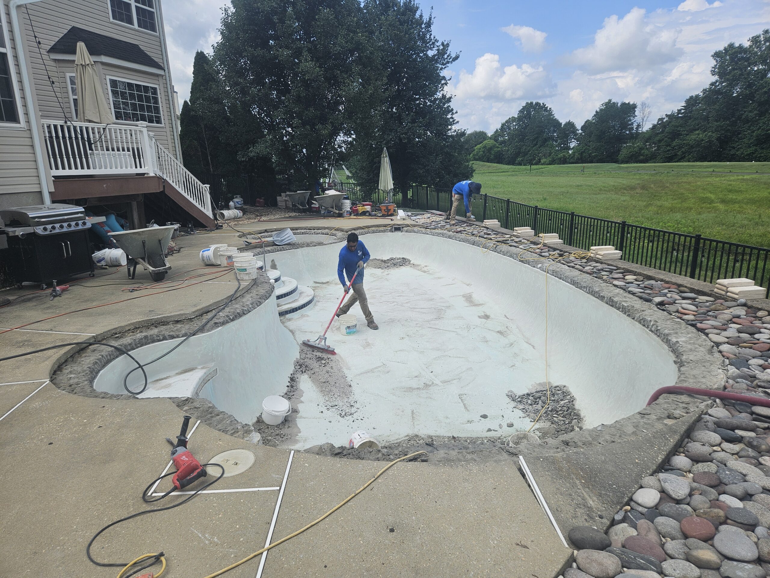 Middletown, de pool renovation with travertine coping and updated tile