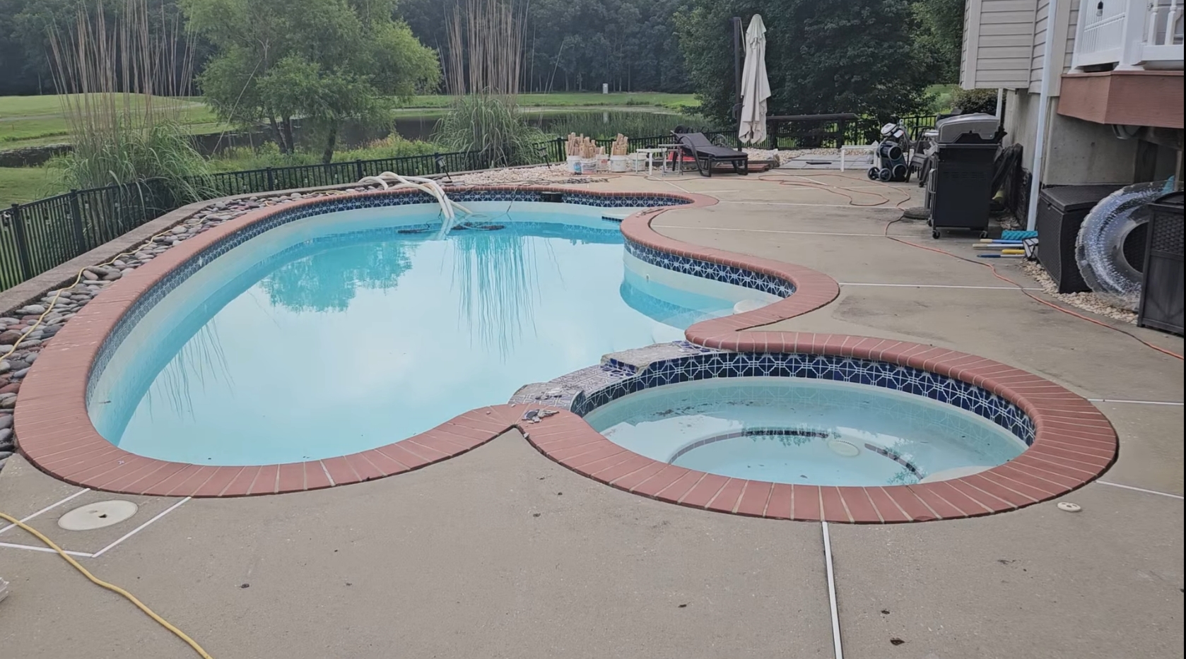 Middletown, de pool renovation with travertine coping and updated tile